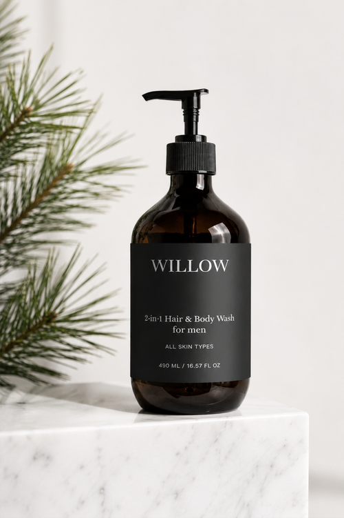 Bottle of Willow 2-in-1 Hair & Body Wash for men on a marble surface with a white background