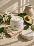 Jar of Willow Keratin Intensive Rescue Hair Mask with avocado and flowers on a textured surface. Jasmine flower, healthy keratin hair strands and avocado ingredients used in Willow Keratin Intensive Rescue Hair Mask. Smooth healthy hair after using keratin intensive rescue hair mask treatment.