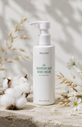 Willow Sensitive Skin Body Cream with cotton flowers and botanical elements, gentle moisturizing body cream for sensitive skin.